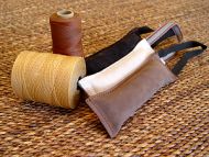 Dog bite tug made of leather with handle